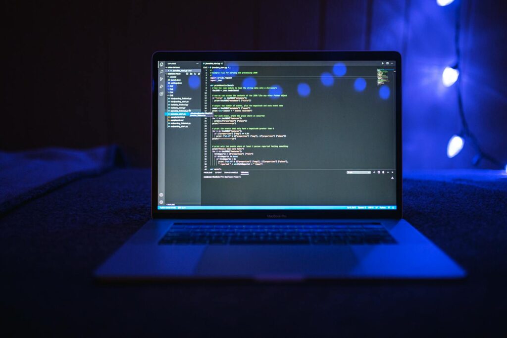 Close-up of programming code on a laptop screen, illustrating Flutter navigation development.
