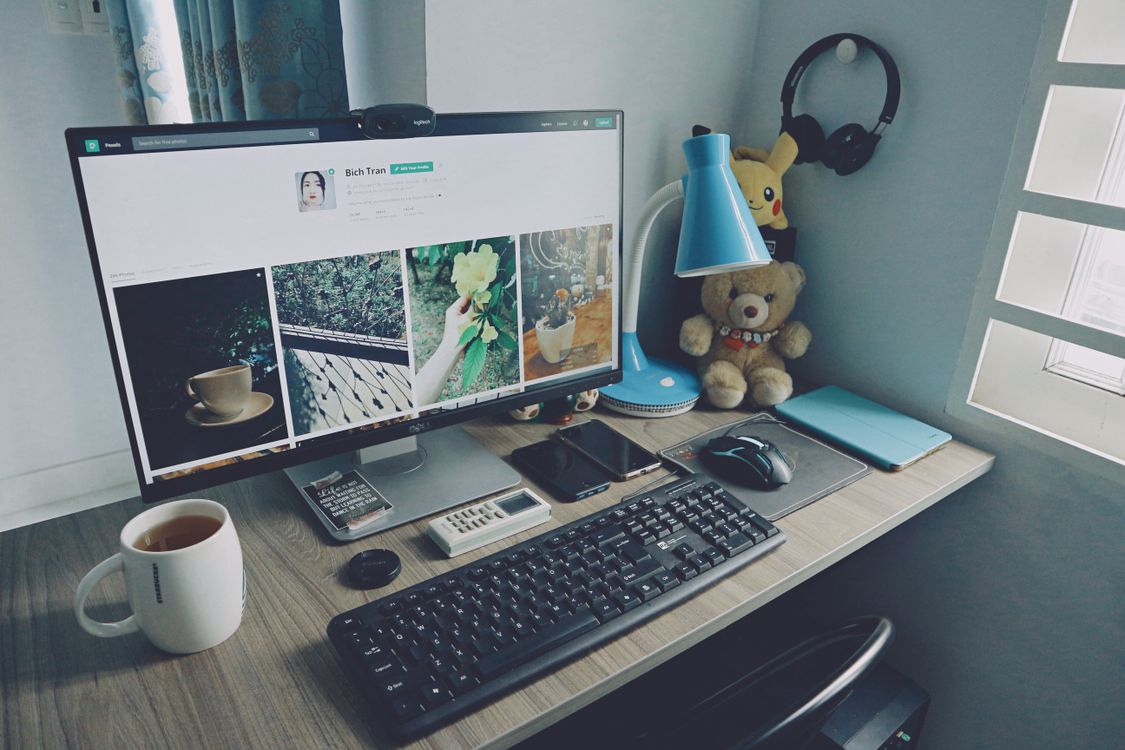Tidy developer desk with monitor and keyboard for coding practice