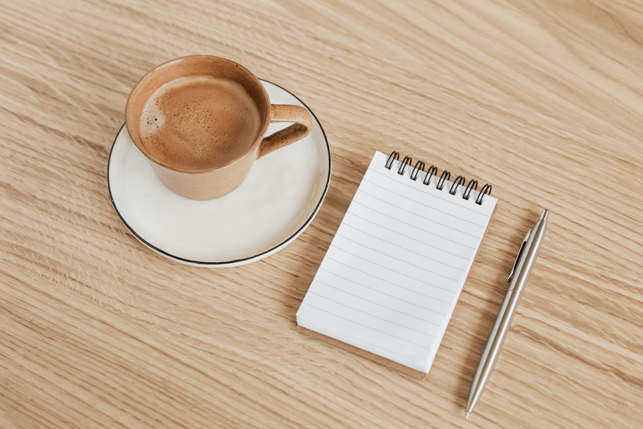 Dart Sets for Beginners: Handle Unique Values Notebook, pen, and coffee on a wooden desk for study